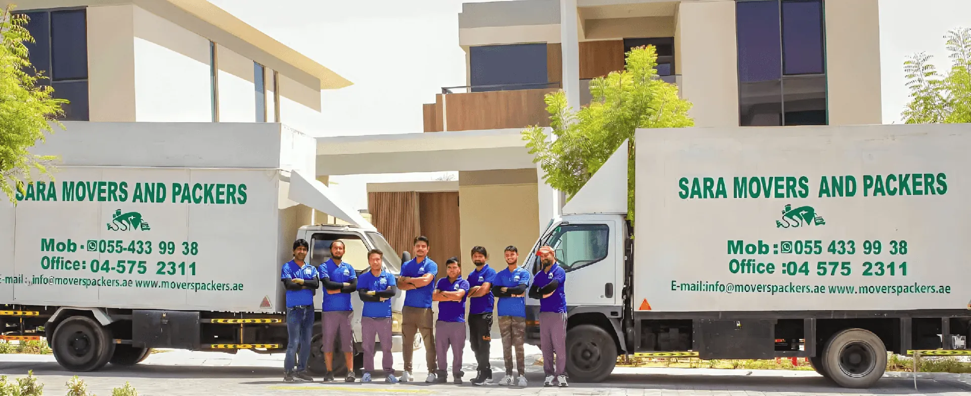 Sara Movers crew with company trucks